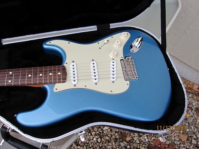 Look at this pic Is this pickguard mint green or parchment? The Gear