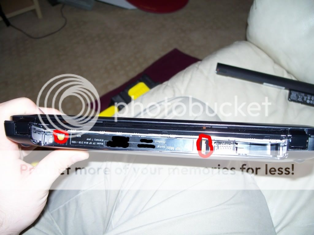 3. See the big black sticker with all the information on it? Under this is  the hard drive, you will need to peel the sticker off CAREFULLY from the  bottom ...